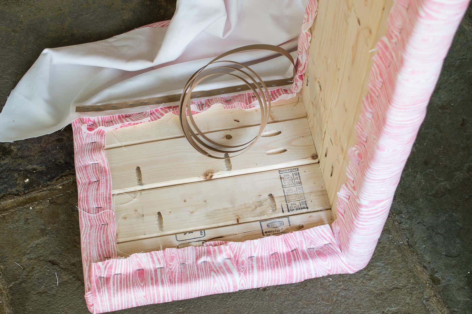 staple tack strip onto one side of the bench