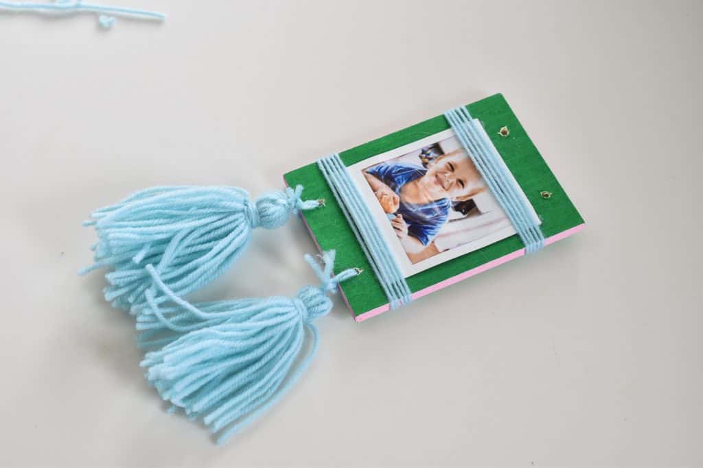 thread yarn through holes with floral wire