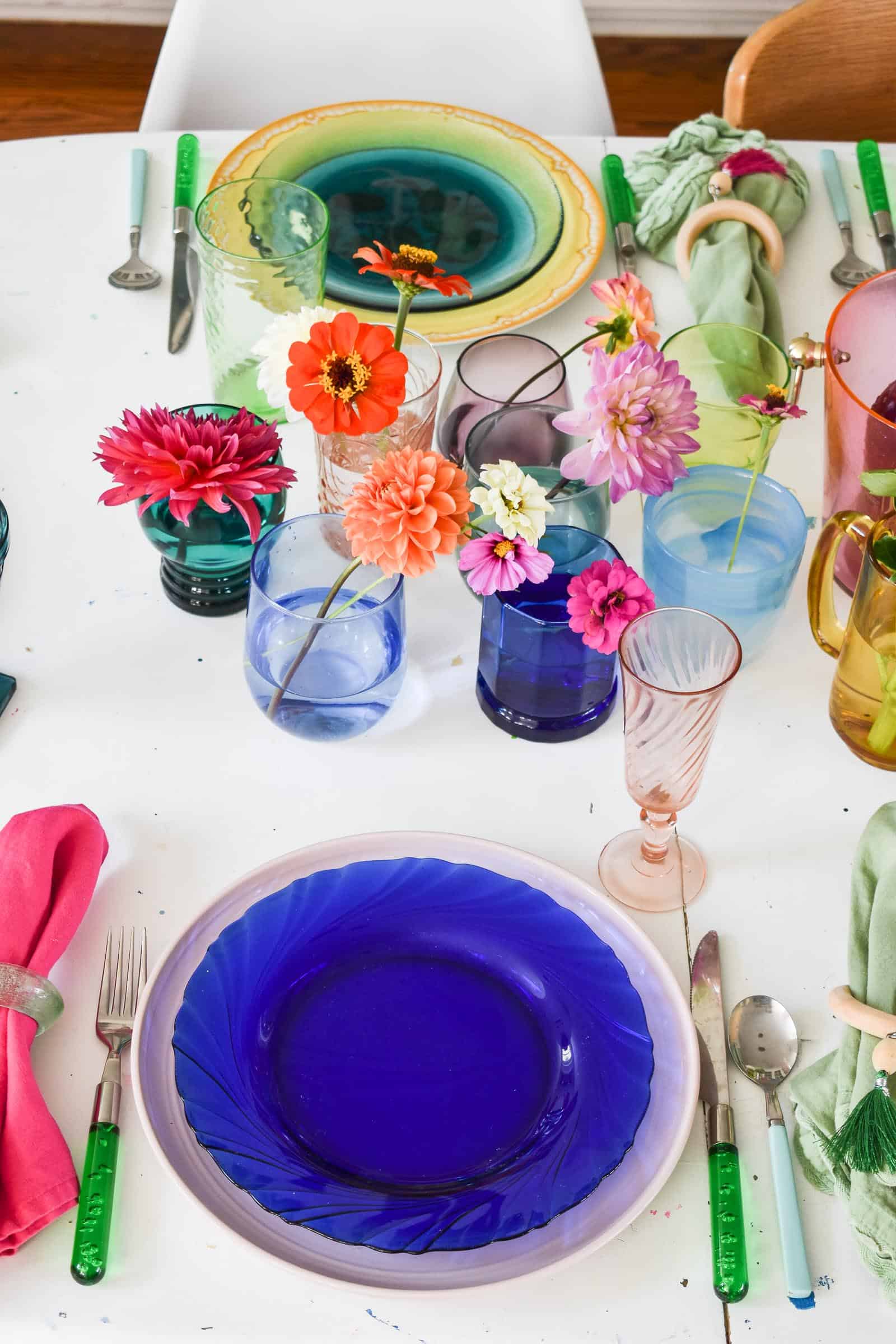 flowers in the middle of a colorful table